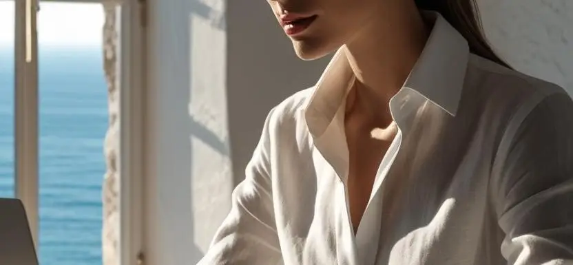 A cinematic editorial photograph of a real estate agent in Mallorca preparing LinkedIn posts on a sleek laptop, elegant office setting, dramatic lighting, highly detailed, full texture, 8k resolution.